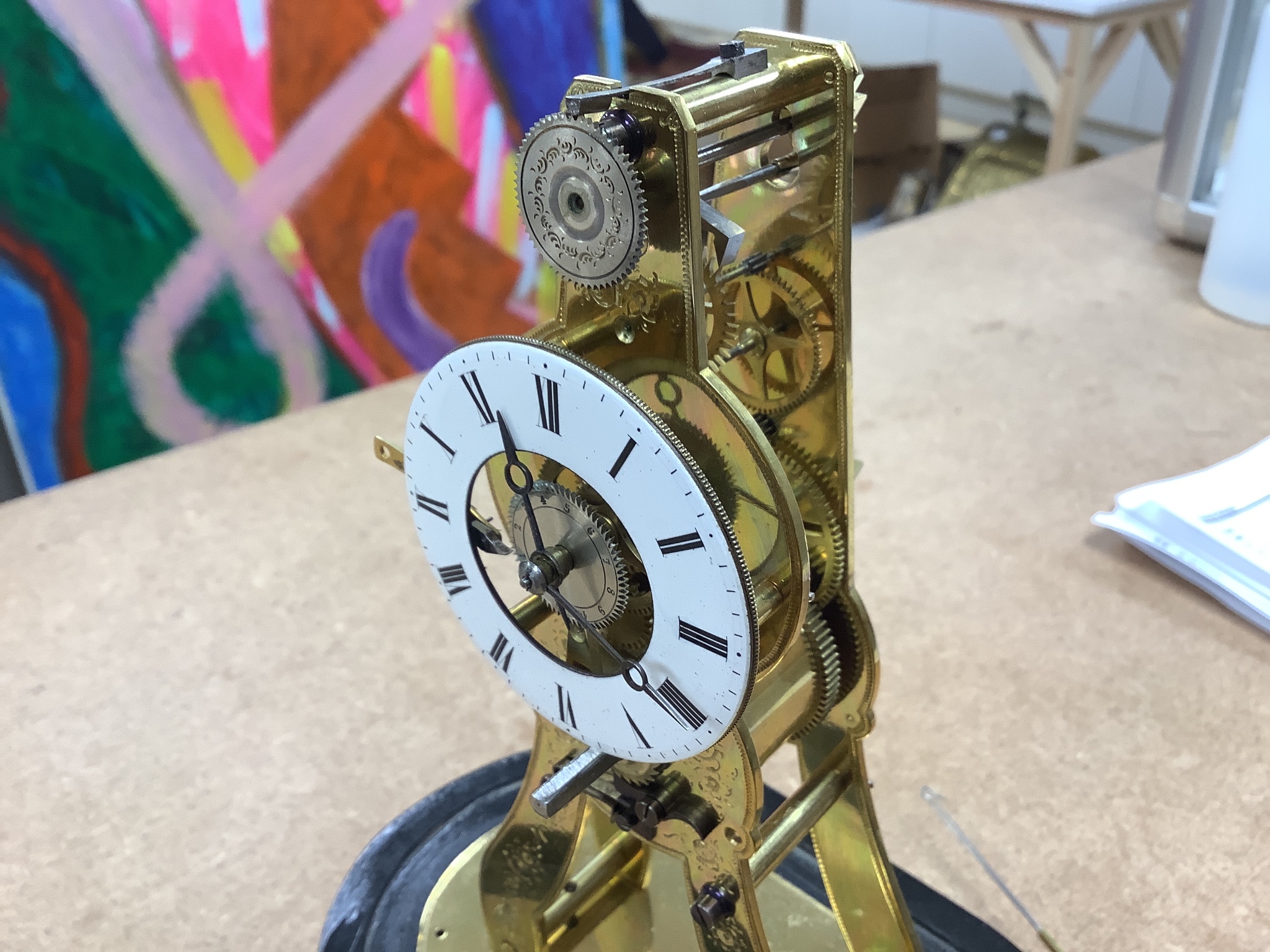 A 19th century French brass skeleton clock, signed MS.Honoraeles Exp. Paris Londres, with alarm disk and pull repeat, under dome, overall height 26cm